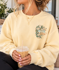 Made New | 2 Corinthians 5:17 Botanical Christian Crewneck